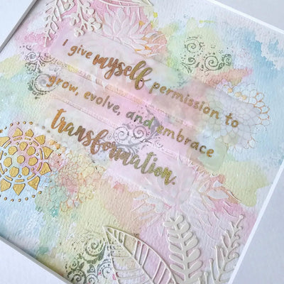 Artchemira mixed media art journal page with watercolour background, botanical stamps, and handwritten transformation quote