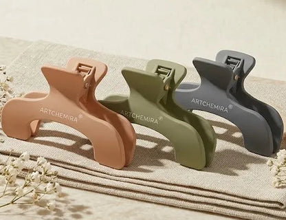 Artchemira trio set of journal clips with peach , sage and cool steel tone on textile and light beige background