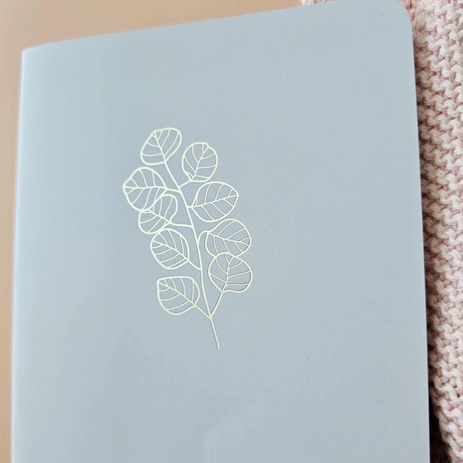 Artchemira large journal in sage green showing gold foil eucalyptus design on cover 