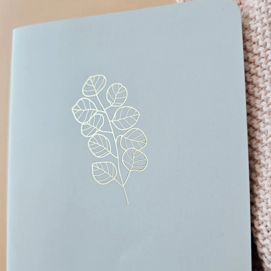 Artchemira large journal in sage green showing gold foil eucalyptus design on cover 
