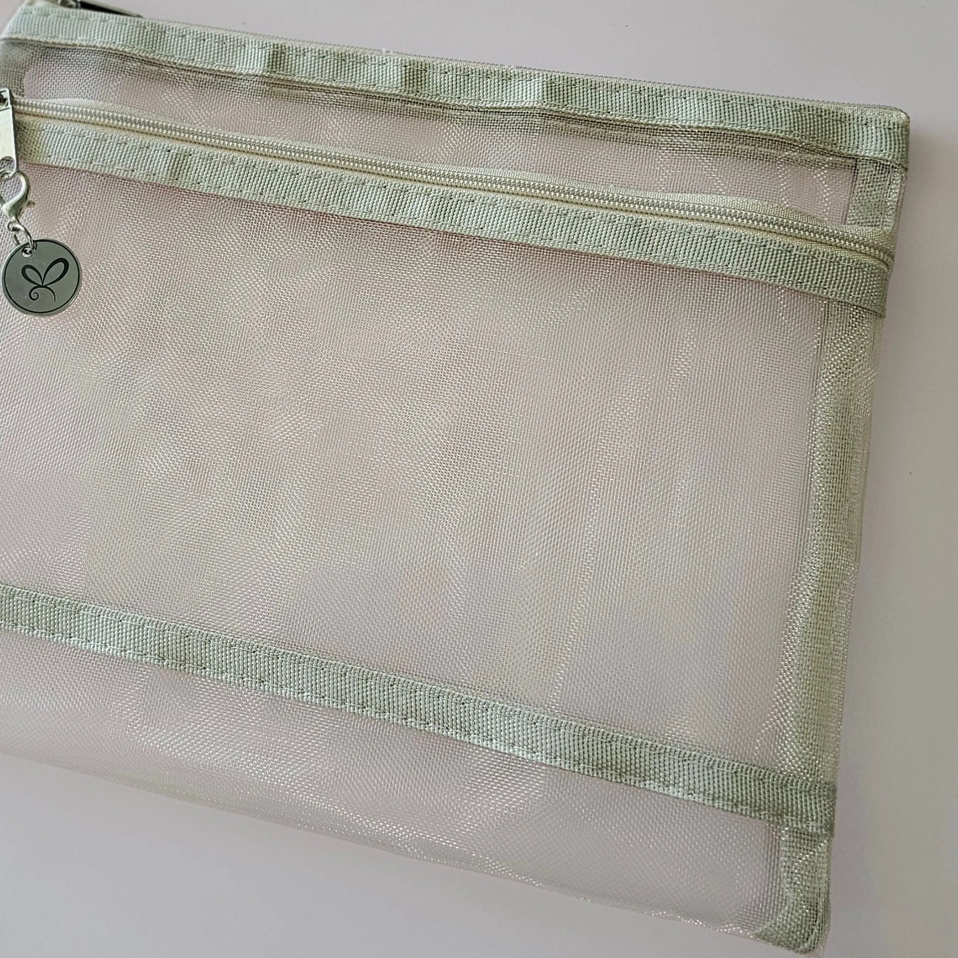 Artchemira A5 pastel beige nylon mesh journaling bag with double zipper, side view