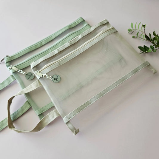 Artchemira A5 nylon mesh journaling bags in pastel sage green and beige  with double zipper, side view